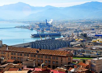 Béjaïa / Bougie, Kabylia, Algeria: view from fort Borj Moussa - synagogue, Ibn Sina high school, port with drydock and container terminal, Babor mountains, Bejaia gulf